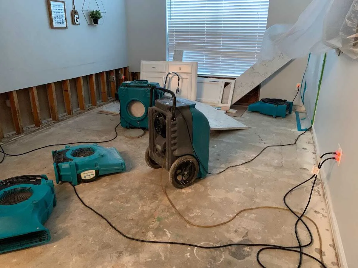 Dehumidifier in flood-cut room for Water Damage Restoration in Tolland